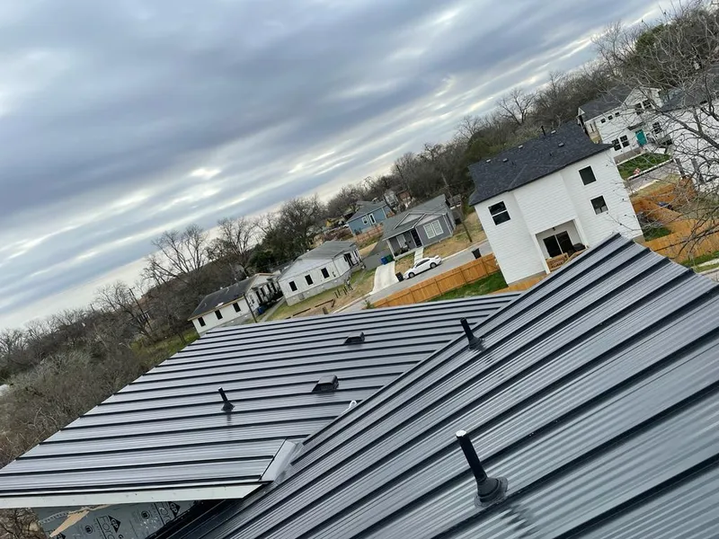 Standing seam metal roof panels with vents for Skylight Repair in Azle